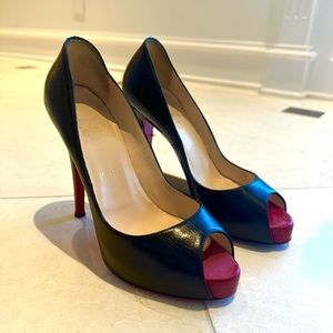 Christian Louboutin Peep Toe Pump!